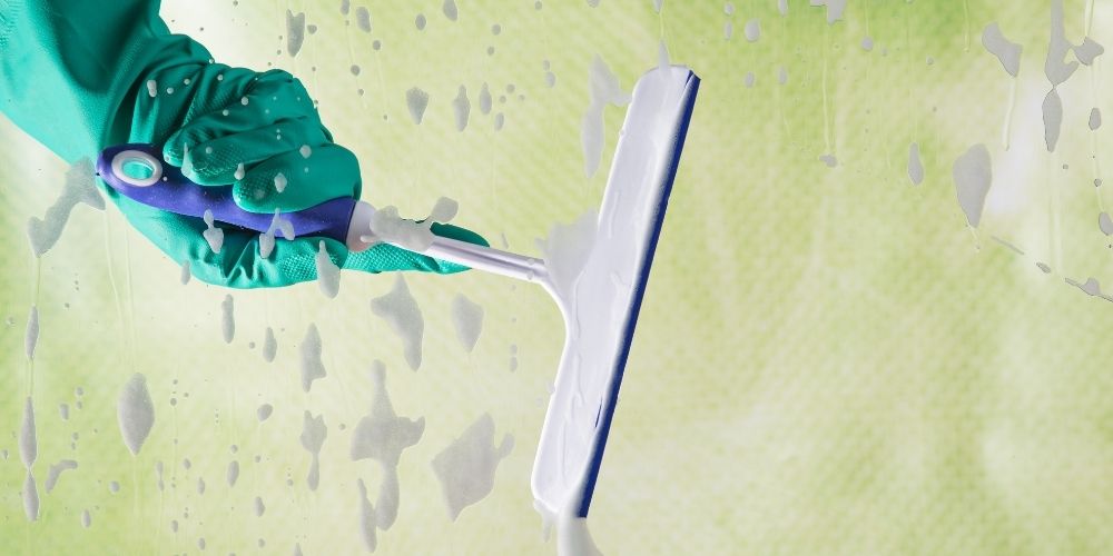 squeegee is useful for cleaning glass shower doors